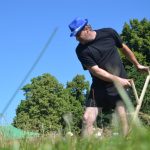 Sečení postaru. Soutěž v kosení trávy měla o bělčické pouti premiéru