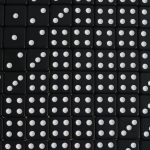 Obraz filmové postavy Johna Wicka poskládali z 20 tisíc hracích kostek