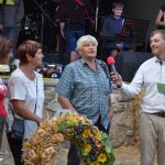 Dožínky v Petrovicích slavili i soutěžemi v hodu balíkem slámy a o nejkrásnější dožínkový věnec